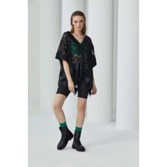 A wholesale clothing model wears 23361 - Guipure Detailed Imitation Leather Oversize Embroidery Blouse - Black, Turkish wholesale Blouse of Mare Style