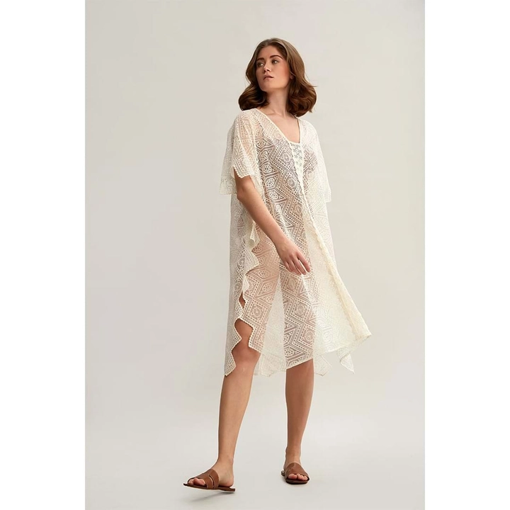 Bir model, Mare Style toptan giyim markasının 33205 - Guipure Detailed Off-White Embroidered Beach Dress - Ecru toptan Elbise ürününü sergiliyor.