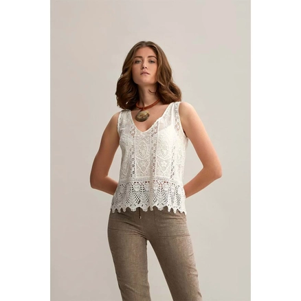 A model wears 33206 - Strapped V Neck Cotton Brode Blouse - White, wholesale undefined of Mare Style to display at Lonca