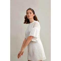 Una modella di abbigliamento all'ingrosso indossa 33209 - Trumpet Sleeve Cotton Mini Embroidery Dress - White, vendita all'ingrosso turca di Vestito di Mare Style