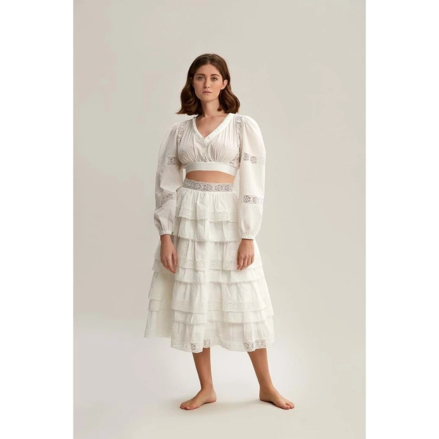 A model wears 33220 - Ruffled Layered Pure Cotton Long Embroidered Skirt - White, wholesale Skirt of Mare Style to display at Lonca