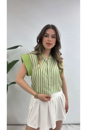 A wholesale clothing model wears  Striped Sleeveless Linen Shirt Blouse
, Turkish wholesale Shirt of Maxi Modena