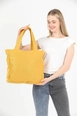 A wholesale clothing model wears mna10421-canvas-shoulder-bag-with-3-compartments-and-2-side-pockets-with-zipper-closure, Turkish wholesale  of 