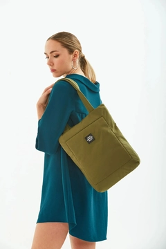 A wholesale clothing model wears mna10480-canvas-daily-hand-and-shoulder-bag-with-snap-closure-and-2-back-pockets-detail, Turkish wholesale Bag of Mina Fashion