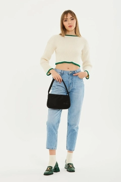 A wholesale clothing model wears mna10545-single-compartment-canvas-fabric-daily-sports-baguette-hand-and-shoulder-bag, Turkish wholesale Bag of Mina Fashion