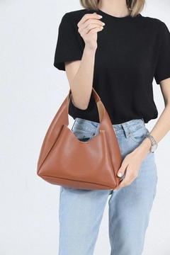 A wholesale clothing model wears mna10711-faux-leather-hand-and-shoulder-bag-with-zippered-interior-compartment-and-wallet, Turkish wholesale Bag of Mina Fashion