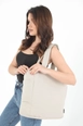 A wholesale clothing model wears mna10970-canvas-shoulder-bag-with-3-compartments-and-2-side-pockets-with-zipper-closure, Turkish wholesale  of 