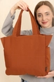 A wholesale clothing model wears mna10043-canvas-shoulder-bag-with-3-compartments-and-2-side-pockets-with-zipper-closure, Turkish wholesale  of 