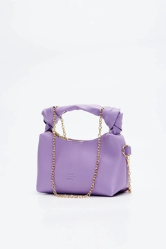 A wholesale clothing model wears mna10105-original-soft-leather-hand-and-shoulder-bag-with-knot-detail-and-chain-strap, Turkish wholesale Bag of Mina Fashion