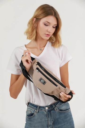 A wholesale clothing model wears  Canvas Unisex Waist And Shoulder Bag With 2 Compartments Adjustable Cross Strap
, Turkish wholesale Bag of Mina Fashion