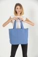 A wholesale clothing model wears mna10182-canvas-shoulder-bag-with-3-compartments-and-2-side-pockets-with-zipper-closure, Turkish wholesale  of 