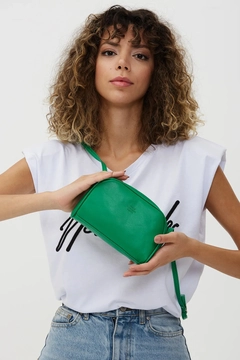 A wholesale clothing model wears mna10269-mini-urban-cross-strap-single-compartment-faux-leather-shoulder-bag, Turkish wholesale Bag of Mina Fashion