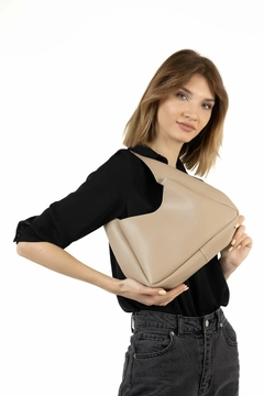 A wholesale clothing model wears mna10294-faux-leather-hand-and-shoulder-bag-with-zippered-interior-compartment-and-wallet, Turkish wholesale Bag of Mina Fashion