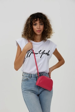A wholesale clothing model wears mna10305-mini-urban-cross-strap-single-compartment-faux-leather-shoulder-bag, Turkish wholesale Bag of Mina Fashion