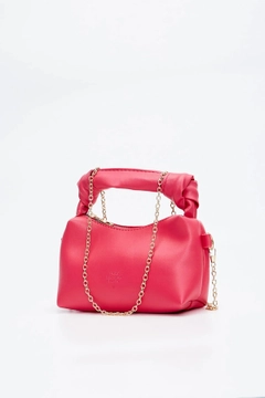 A wholesale clothing model wears mna10387-original-soft-leather-hand-and-shoulder-bag-with-knot-detail-and-chain-strap, Turkish wholesale Bag of Mina Fashion