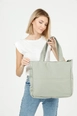 A wholesale clothing model wears mna11271-canvas-shoulder-bag-with-3-compartments-and-2-side-pockets-with-zipper-closure, Turkish wholesale  of 