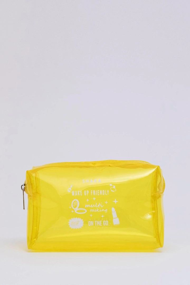 A wholesale clothing model wears mna11568-transparent-pvc-travel-&-makeup-bag, Turkish wholesale Bag of Mina Fashion
