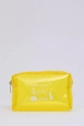 A wholesale clothing model wears mna11568-transparent-pvc-travel-&-makeup-bag, Turkish wholesale  of 