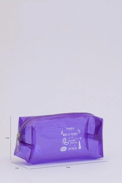 A wholesale clothing model wears mna11571-rectangular-transparent-pvc-travel-&-makeup-bag, Turkish wholesale Bag of Mina Fashion