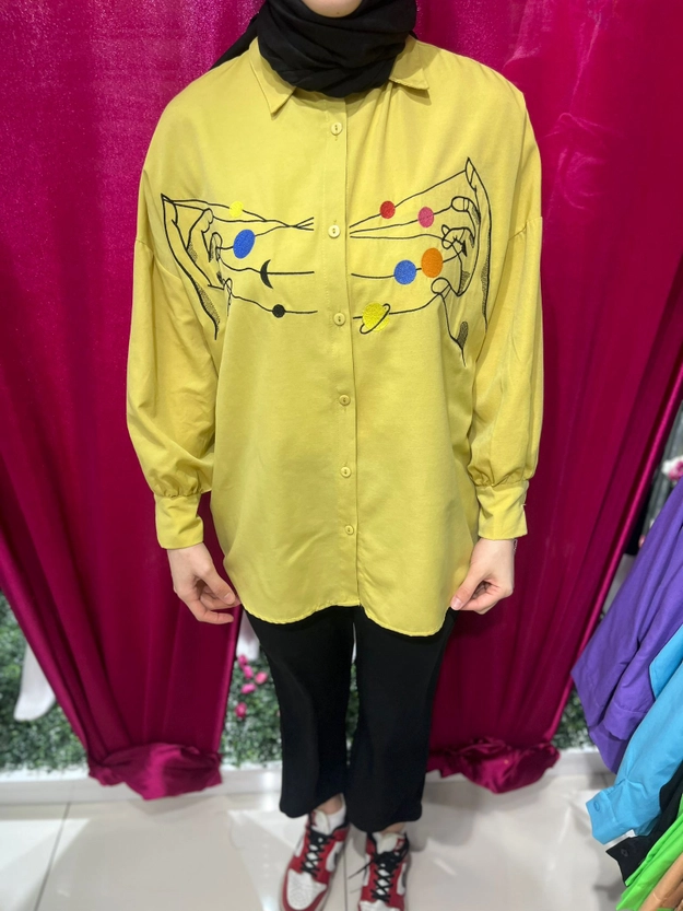 A model wears 47383 - Shirt - Mustard, wholesale Shirt of Miena to display at Lonca