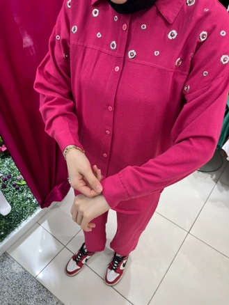 A model wears 47403 - Suit - Pink, wholesale Suit of Miena to display at Lonca