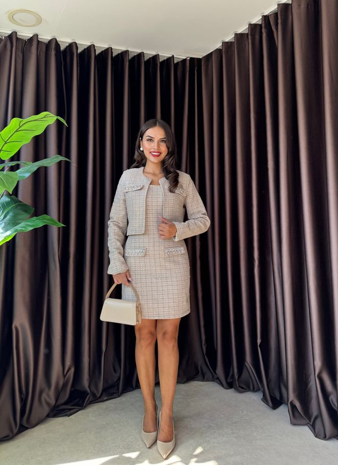 Miss Janell جيبة بيوكون ميني باللون البيج منقوشة بشبكة وجيب رفرف ملابس بالجملة محتشم