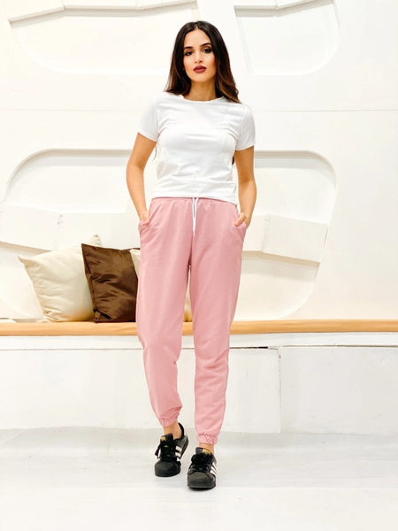 A model wears 35773 - Sweatpants - Powder Pink, wholesale Sweatpants of Miyalon to display at Lonca