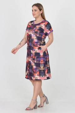 A wholesale clothing model wears MRO10025 - Lilac Patterned Midi Plus Size Viscose Dress, Turkish wholesale Dress of Mode Roy