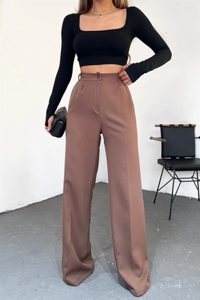 A model wears MRO10183 - High Waist Palazzo Pants - Brown, wholesale Pants of Mode Roy to display at Lonca
