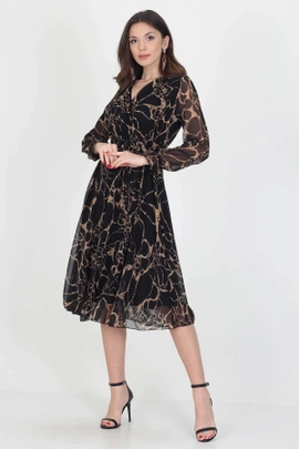 A model wears 40835 - Lined New Season Double Breasted Neck Midi Length Chiffon Dress, wholesale undefined of Mode Roy to display at Lonca