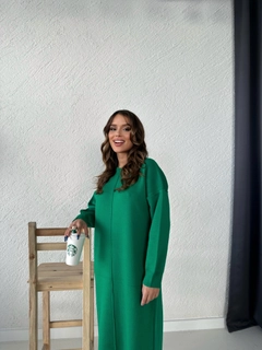 A wholesale clothing model wears myf10159-knitted-stitched-dress-green, Turkish wholesale Dress of My Fashion