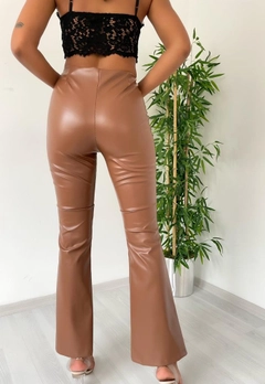 A wholesale clothing model wears 42490 - LEATHER PANTS, Turkish wholesale Pants of MyBee