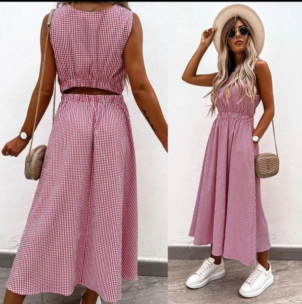 A model wears MYB10156 - Polka Dot Dress - Pink, wholesale Dress of MyBee to display at Lonca