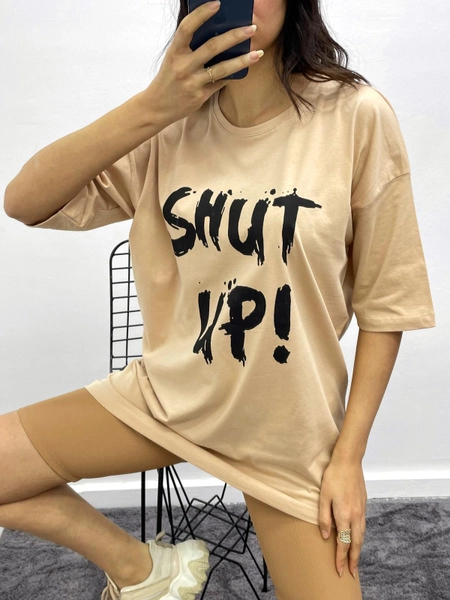 A model wears MYB10188 - T-Shirt Shut Up - Beige, wholesale Tshirt of MyBee to display at Lonca