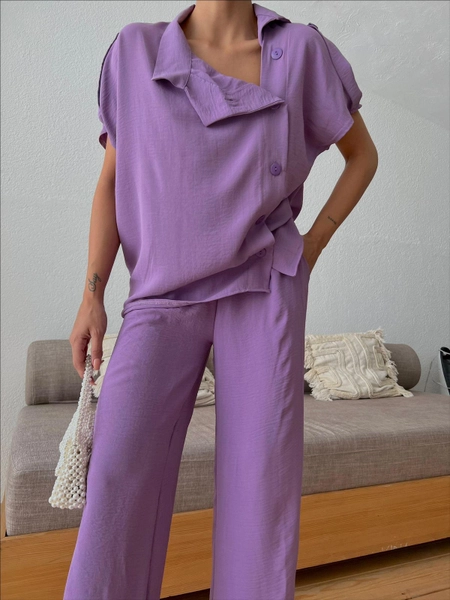 A model wears MYB10203 - Aerobin 2 Piece Suit - Lilac, wholesale Suit of MyBee to display at Lonca