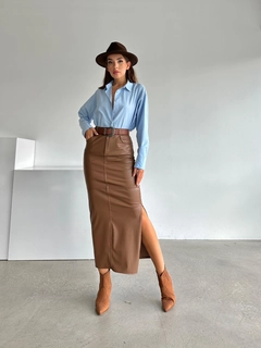 A wholesale clothing model wears myd10118-long-leather-skirt, Turkish wholesale Skirt of MyDükkan