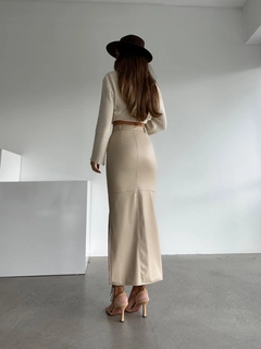 A wholesale clothing model wears myd10117-long-leather-skirt, Turkish wholesale Skirt of MyDükkan
