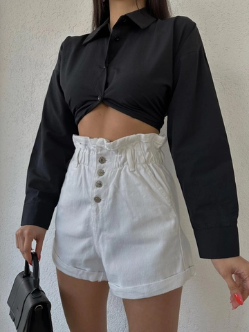 Bir model, MyDükkan toptan giyim markasının  Beli Lastikli Şort
 toptan Kot Şort ürününü sergiliyor.