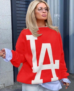 Bir model, My Jest Fashion toptan giyim markasının MJF10078 - La Knitwear Sweater toptan Tunik ürününü sergiliyor.