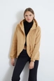 A wholesale clothing model wears new10135-raised-3-thread-long-sleeve-hooded-zippered-women's-sweatshirt-beige, Turkish wholesale  of 