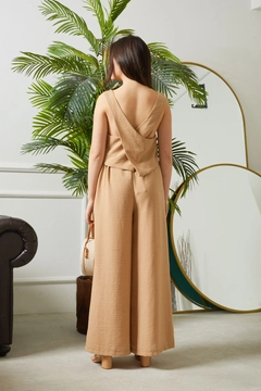 A wholesale clothing model wears new10213-asymmetrical-back-detail-tank-collar-waist-elastic-trousers-women's-summer-suit-mink, Turkish wholesale Jumpsuit of Newgirl