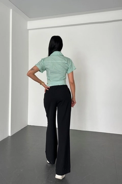 A wholesale clothing model wears new10258-shirt-collar-stripe-pattern-top-wide-leg-elastic-bottom-set-green-&-black, Turkish wholesale Suit of Newgirl