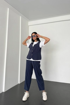 A wholesale clothing model wears new10270-loose-cut-trousers-front-vest-detailed-crew-neck-suit-navy-blue, Turkish wholesale Suit of Newgirl