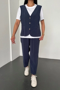 A wholesale clothing model wears new10270-loose-cut-trousers-front-vest-detailed-crew-neck-suit-navy-blue, Turkish wholesale Suit of Newgirl