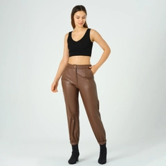 A wholesale clothing model wears ofo10433-leather-trousers-with-elastic-legs, Turkish wholesale Pants of Offo