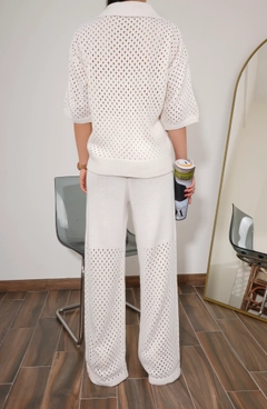 A wholesale clothing model wears pan10109-openwork-zippered-knitwear-set, Turkish wholesale Suit of PANDA
