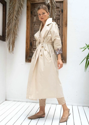 A model wears 30230 - Trenchcoat - Stone, wholesale undefined of Perry to display at Lonca