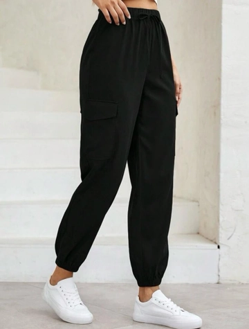A wholesale clothing model wears  Cargo Pocket Two Thread Bottom Tracksuit
, Turkish wholesale Sweatpants of Polo Bonetta