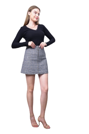 A model wears 18543 - Mini Skirt - Grey, wholesale Skirt of Playmax to display at Lonca