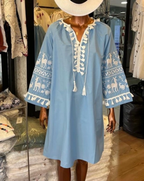 A model wears 28892 - Dress - Blue, wholesale Dress of Ilia to display at Lonca